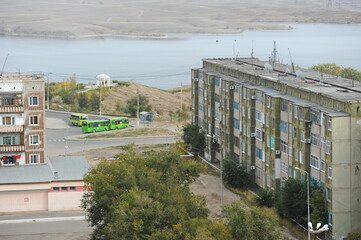 Zhezkazgan, Kazakhtan - 10.10.2016 : Residential buildings, commercial buildings and courtyards along the central streets of the city.