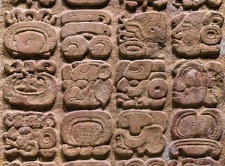 Mayan Alphabet. Close up of hieroglyph or glyph writing system found in Copan (Honduras), Tikal...