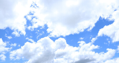 Obraz na płótnie Canvas Blue sky white clouds. Puffy fluffy white clouds.