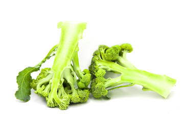 Two halves of organic fresh broccoli cabbage isolated on white background.