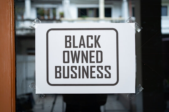 Black Owned Business Sign On The Window