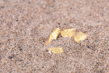 The exposed part of the gold mine buried in the sand