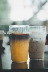 Iced black coffee mix orange juice and iced latte