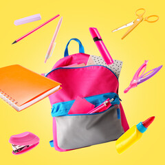 Flying backpack with school supplies on color background