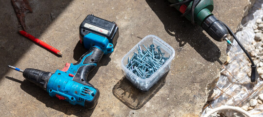 Self-tapping screws at a construction site.