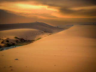 Beautiful scenery of Mui Ne sand dune in Vietnam during sunset time.