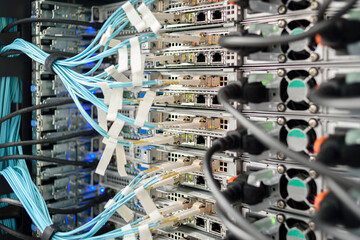 Working servers, switches or routers in data center with a lot of led lamps and cables