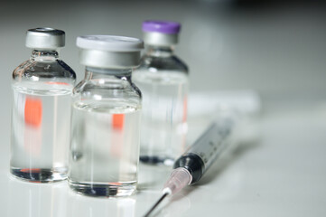 Selective Focus of Syringe and Medicine in vial , ready for vaccine injection , Cancer Treatment ,...
