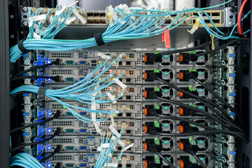 Working servers, switches or routers in data center with a lot of led lamps and cables
