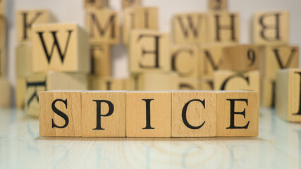 The word Spice was created from wooden letter cubes. Gastronomy and spices.