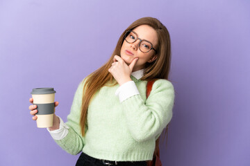 Teenager student girl over isolated purple background having doubts