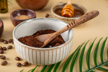 Ingredients for making homemade coffee skincare scrub on a table close up. Eco friendly cosmetics