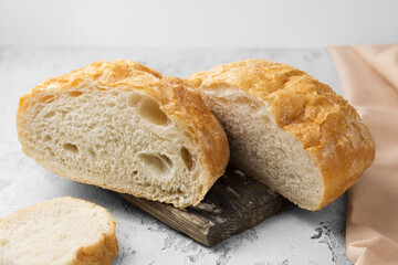 fresh sliced bread on wooden table