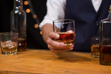 Bartender Serve Whiskey, on wood bar, 