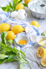 Ingredients for making traditional homemade lemon cake, fresh summer baking items