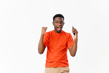 Naklejka premium man with a phone in his hands gesturing with his hands communication technology