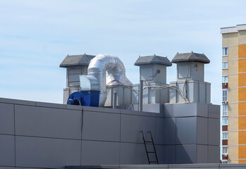 Elements of the ventilation system on the roof of the building