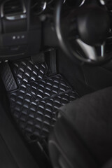 leather floor mat with diamond shape texture. eco leather luxury floor mat on the front row car...