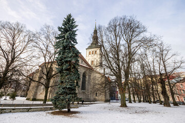 Fototapeta na wymiar Tallinn, Estonia. St. Nicholas Church (Niguliste kirik), a former church that now houses Niguliste Museum, part of the Art Museum of Estonia