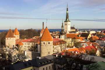 Tallinn, Estonia. Aerial view at sunset of the Old Town with the Church of St Olaf and the towers. A World Heritage Site