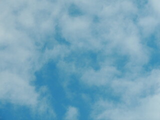 Blue sky with clouds over Russia. Summer skies. Russian sky with clouds. Gray-white and blue colors. Eco Sky in 2021. A sunny day.