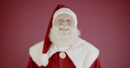 Santa Claus smiling looking at the camera.