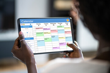 Executive Using Digital Calendar Agenda