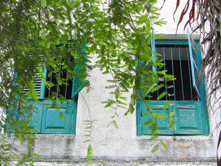window with shutters in the old Stone Town on Zanzibar, Tanzania