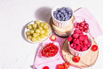 Fresh raspberries, blueberries, grape, sweet cherries, and red currants