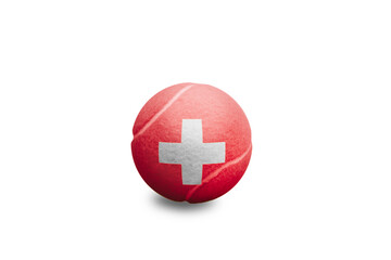 Obraz premium Tennis ball with the coloured national flag of Switzerland on the white background