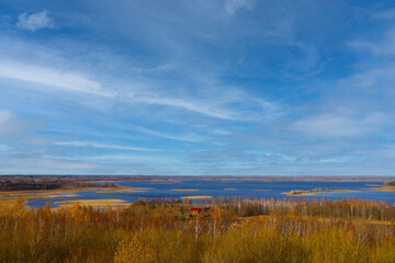 Blurry background, out of focus. View from the drone on the lakes and forest in the fall.