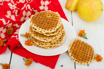 Stack of appetizing round waffles