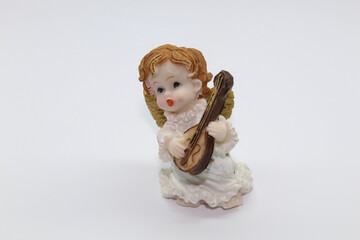 Ceramic white playing little angel