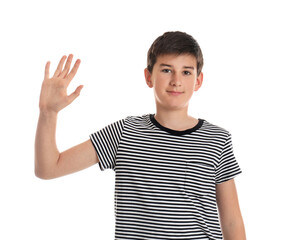Happy teenage boy waving to say hello on white background
