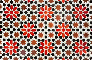 Decorative background in arabic mosaic style. Morocco style star tiles. Composition of star tiles in red, brown and black color on a white background.