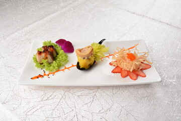 Chinese dim sum cold cut meat appetiser combo dishes platter in white background appetiser halal...