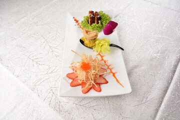Chinese dim sum cold cut meat appetiser combo dishes platter in white background appetiser halal menu