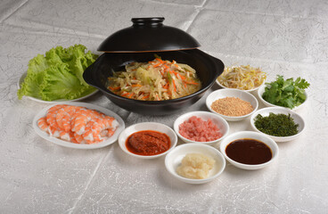 diy Traditional popiah spring roll wrapped with vegetables and prawn in sauce platter set in white background appetiser halal menu