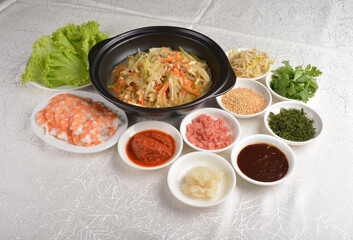 diy Traditional popiah spring roll wrapped with vegetables and prawn in sauce platter set in white background appetiser halal menu