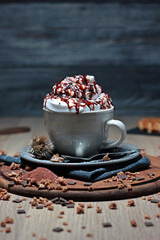 cup of hot chocolate with whipped cream and caramel sauce