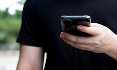 Close-up of a man holding a smartphone