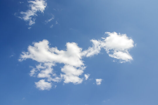 Background of a blue sky with clouds. Nature