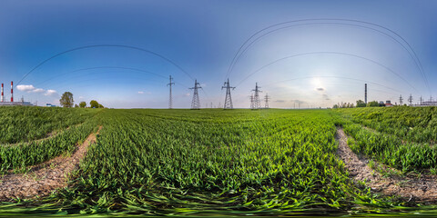 full spherical hdri panorama 360 degrees angle view on field with  high voltage electric pylon...