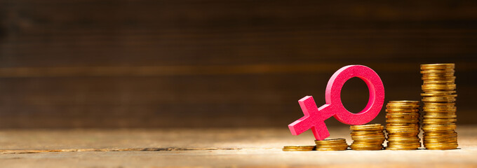 Gender discrimination. The salaries of women are higher. Stacks of coins, steps up, and a female...