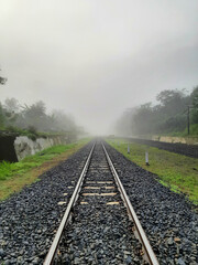 Fototapeta na wymiar railroad in fog