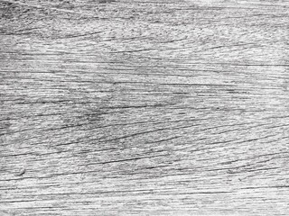 The faded old wooden floor is photographed horizontally with a unique pattern.