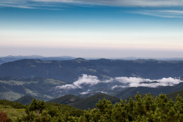 mountain tops and fog at the bottom