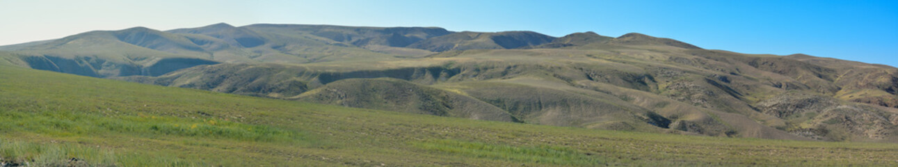 Fototapeta na wymiar Panoramic view of the hill. Eskeldinsky district. Almaty region, Kazakhstan.