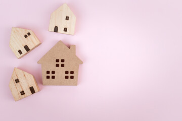 house wood model concept on blue background and copy space for your text investment insurance and home purchase mortgage real estate concept