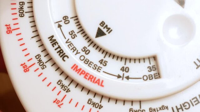 BMI indicator high, arrow showing very obese mark, unhealthy obesity problem, health issues, diet, keeping fit abstract concept Measurement tool, bmi calculator object scale detail, extreme closeup